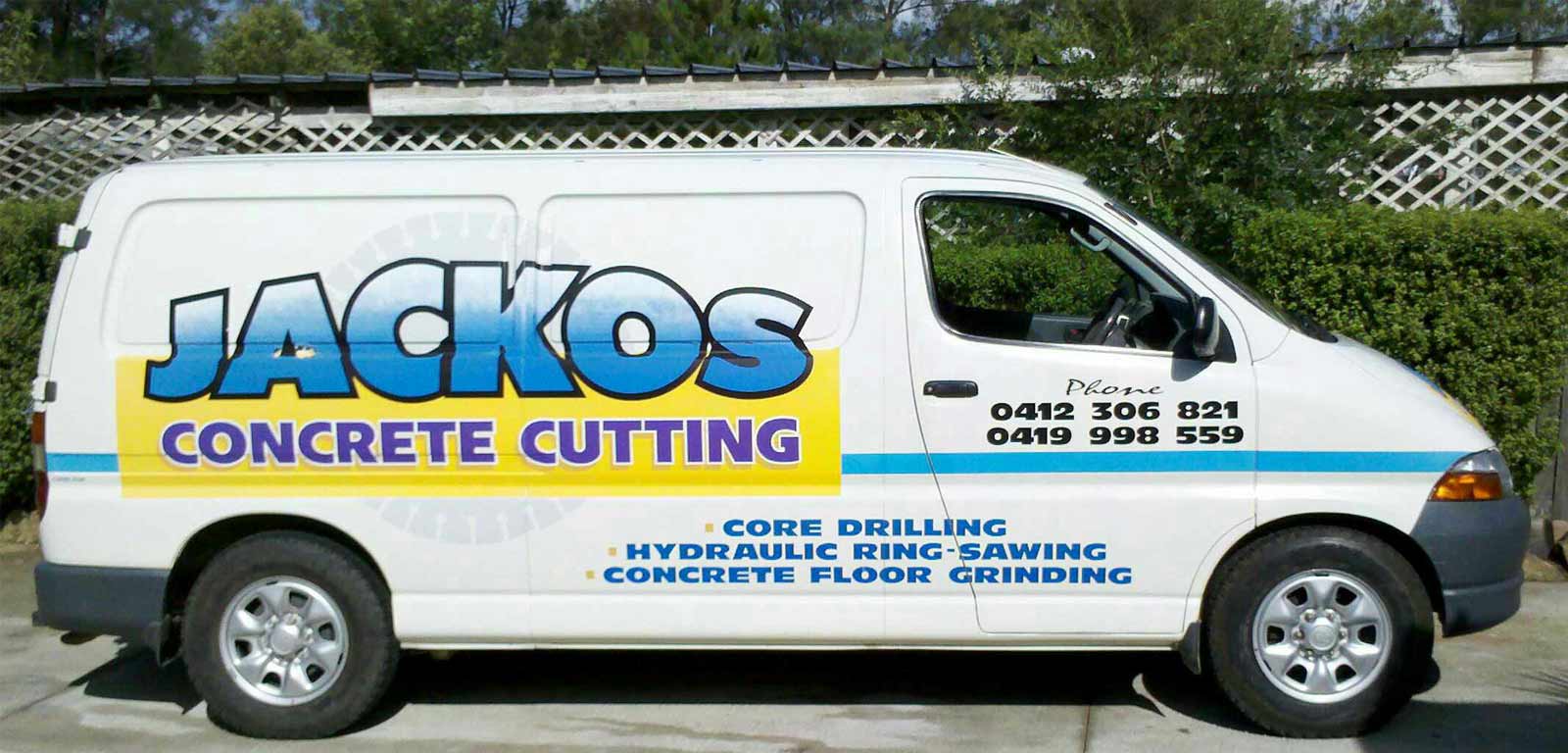 jackos concrete cutting company van side view