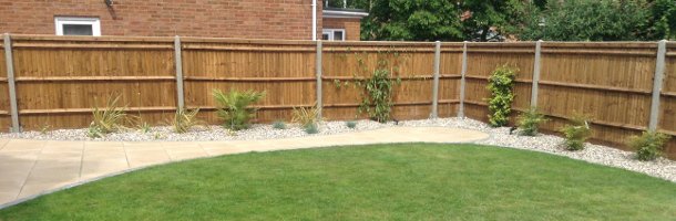 A wooden fence in a garden