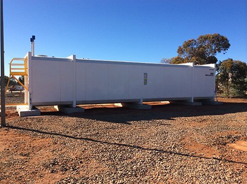 View of a white container with installed machine