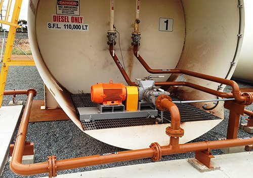 View of an oil container attached to big pipe