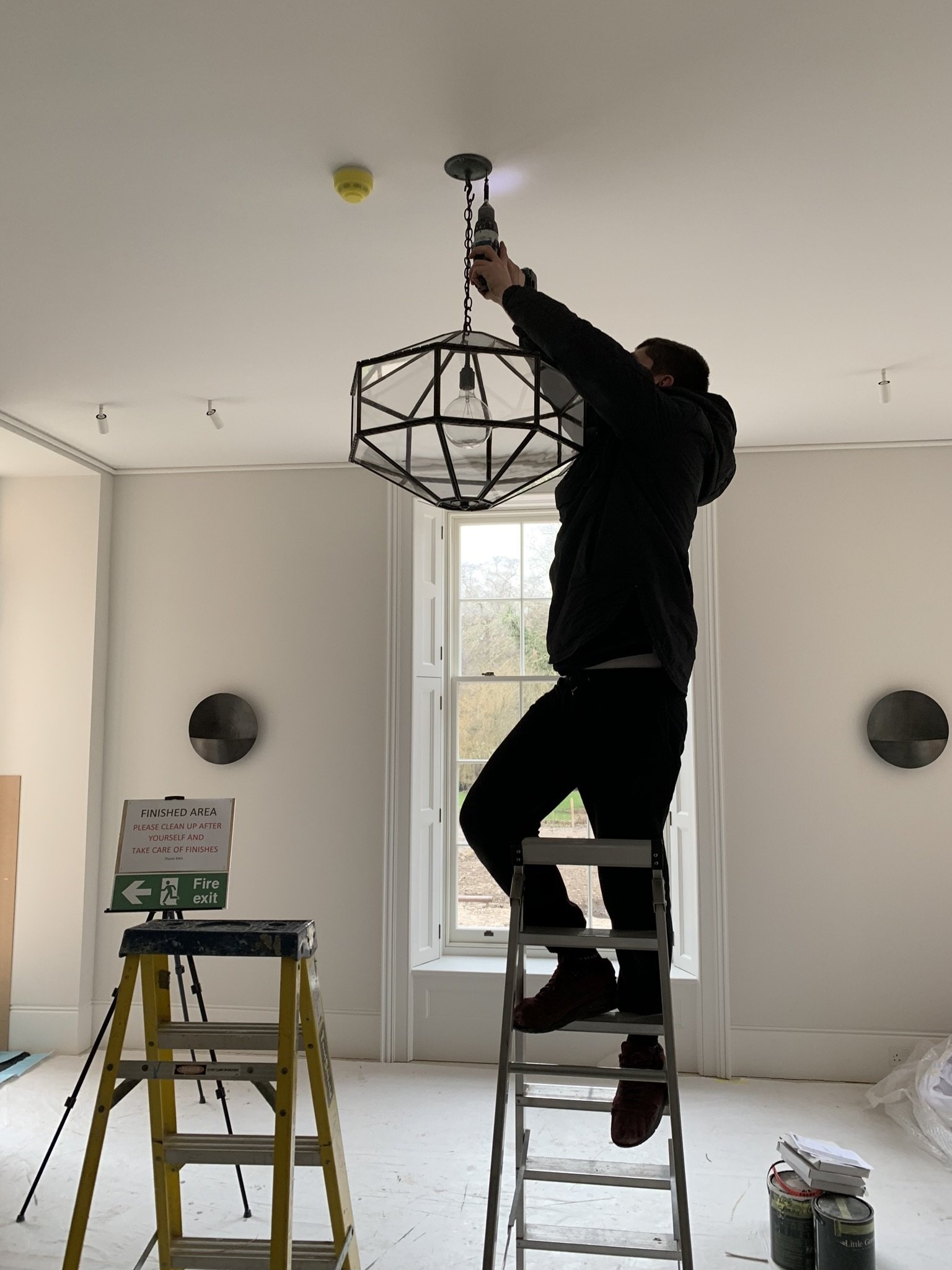 Chandelier installation Bluebird Carriers