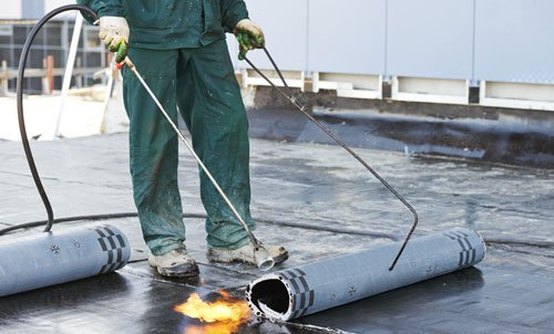 Worker working on a roof