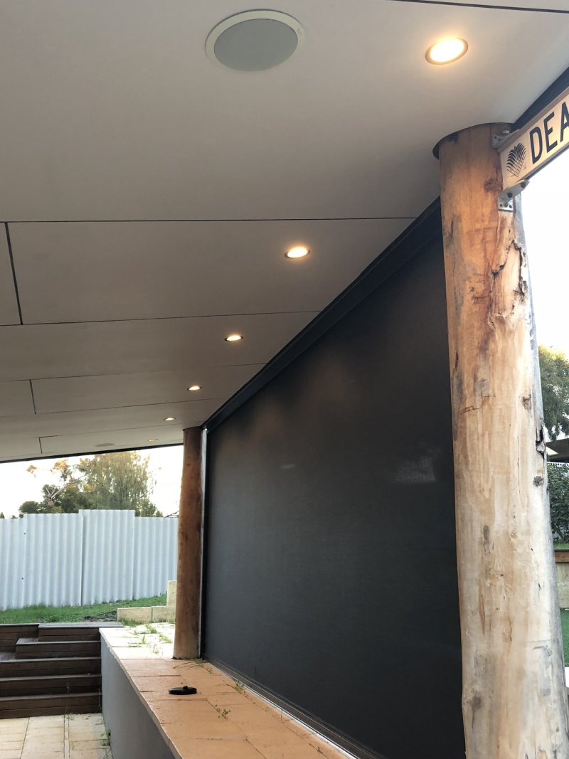 Wall mounted UHD Tv and ceiling lights