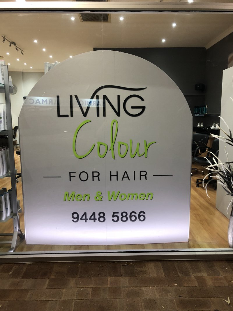 Living color hair glass signage