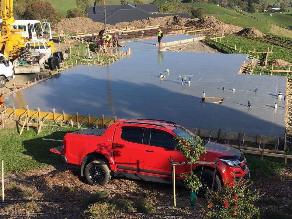Concrete contractors working together on a project in Napier