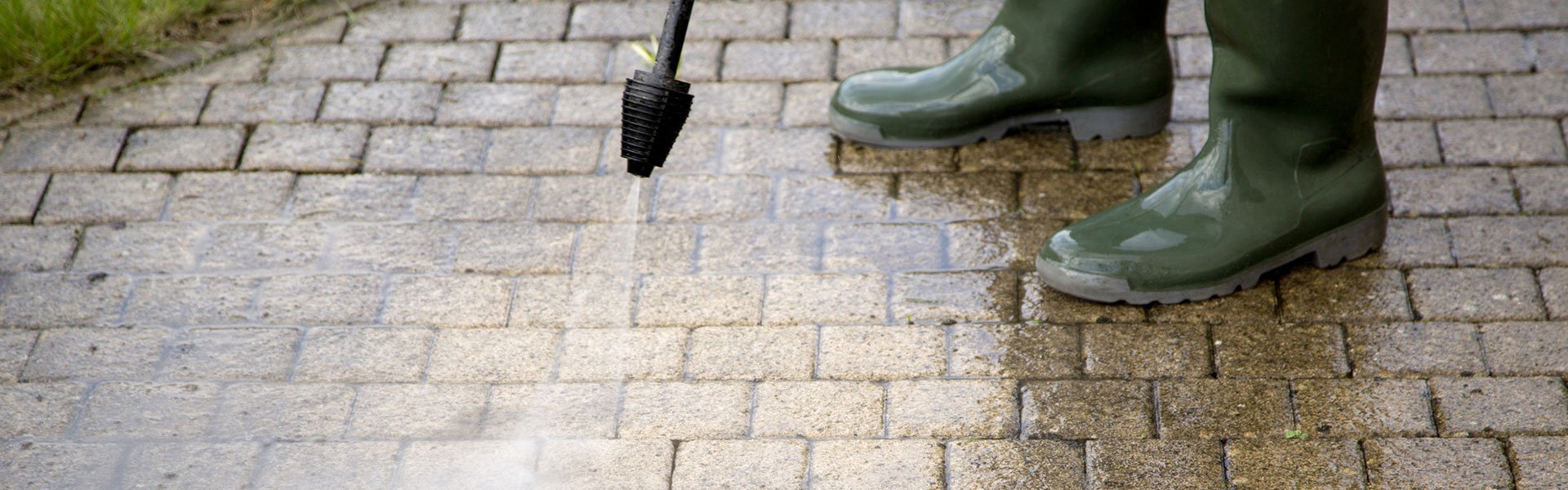 Path And Patio Cleaning Services Crystal Clear A Skilled Cleaner Using Pressure Washing System For Patio Cleaning