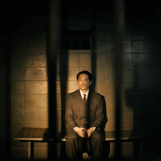 a person in prison dressed in a suite