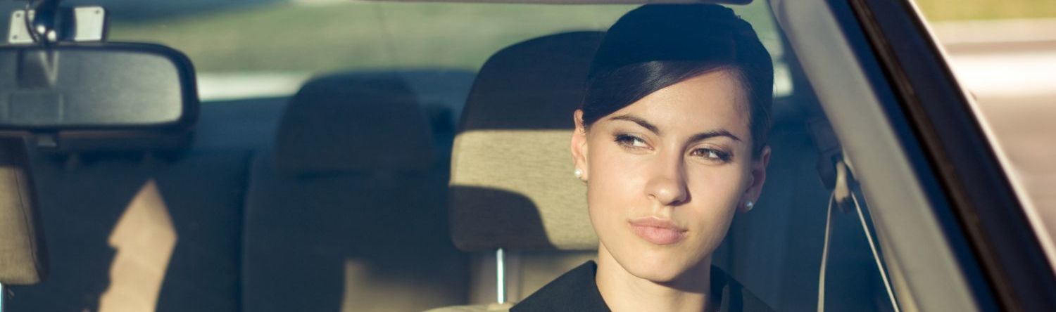 Woman admiring professional windscreen repair job in Christchurch