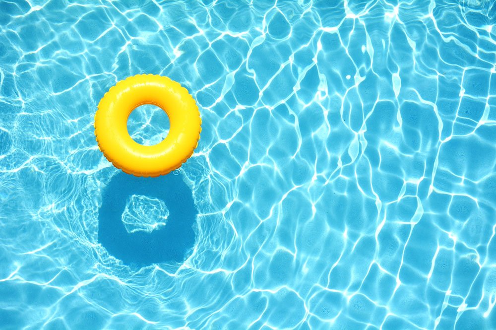 Ring floating in a refreshing blue swimming pool in QLD