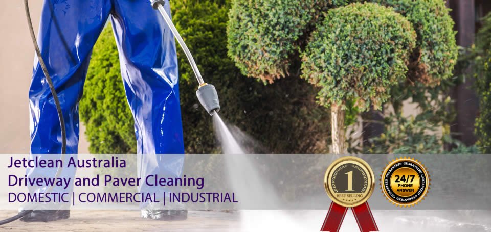 Professional pressure cleaning and high pressure cleaning of residential properties in action.