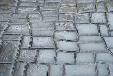 Most wet look sealers are of the solvent-based, acrylic type. Over the last few years penetrating sealers have evolved that also darken the surface without the glossy look. Often used on paver sealing and stone sealing jobs where the gloss is not desired. 