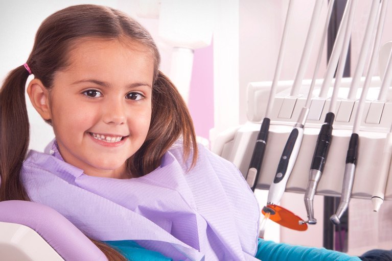 happy girl at the dentist