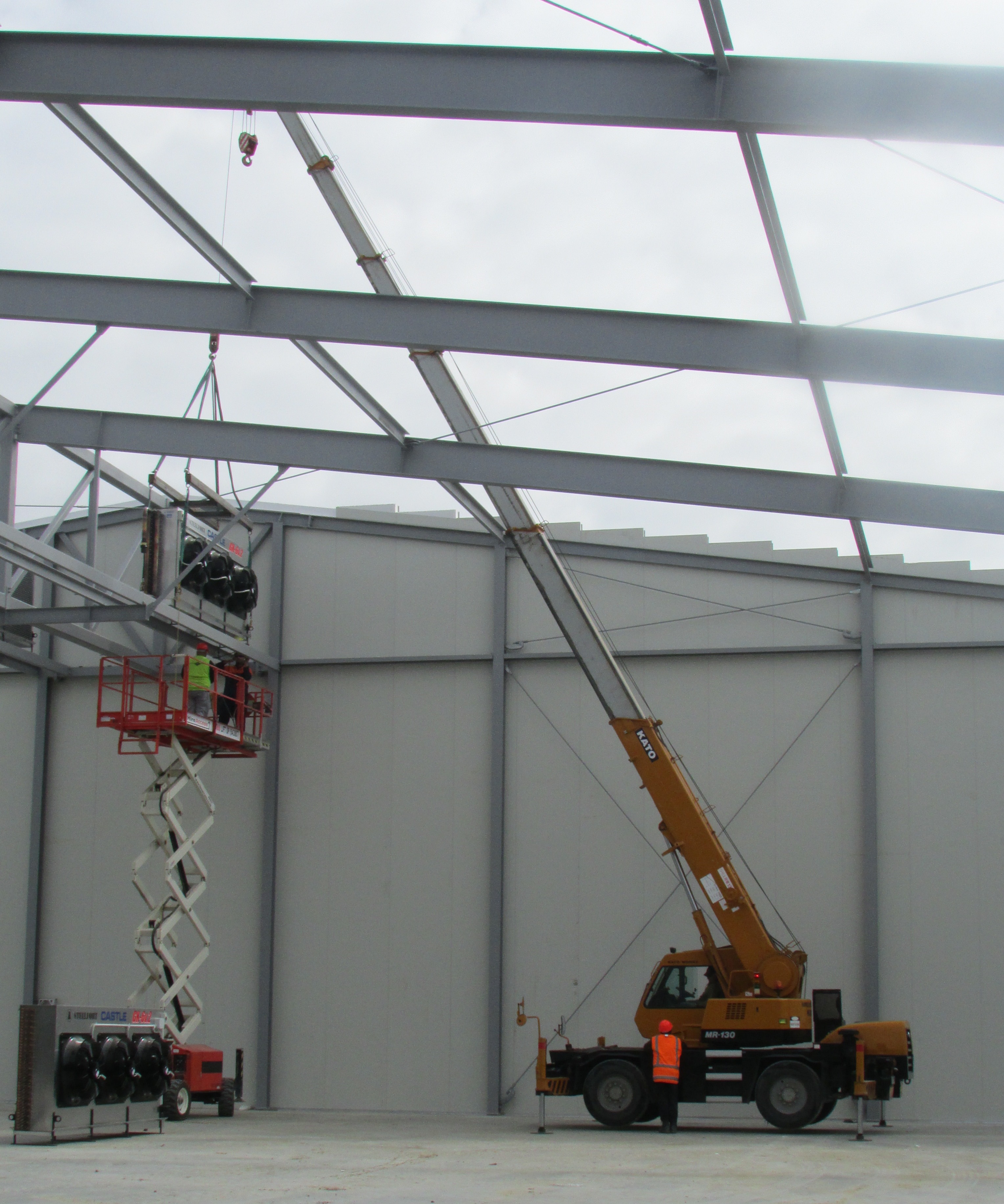 Heavy cranes at construction site