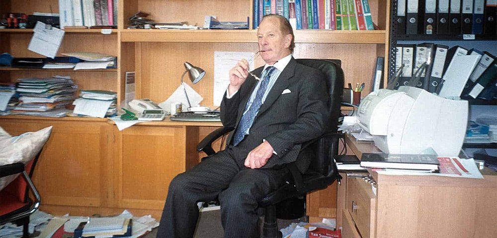 photo of james cahill in office