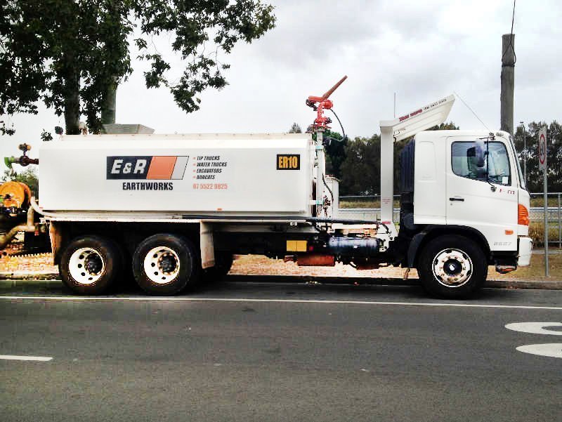 White heavy truck of bobcat equipment hire in Gold Coast