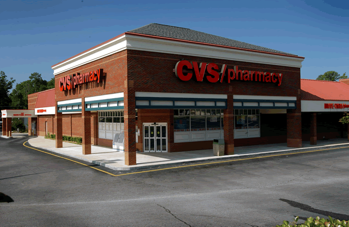 A cvs pharmacy is located in a brick building