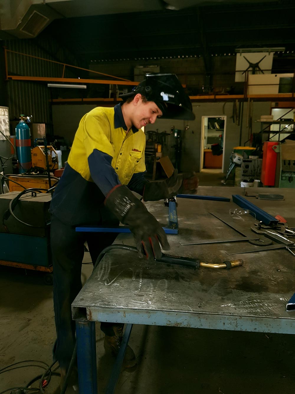 guy-working-with-metal