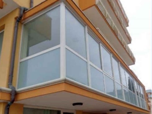 Porte e infissi su misura rimini nuovinfissi nostre realizzazioni Veranda su balcone