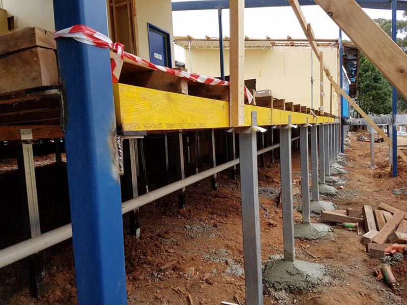 close up of concrete stumps on commercial building