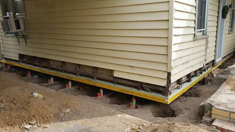 side of home being raised