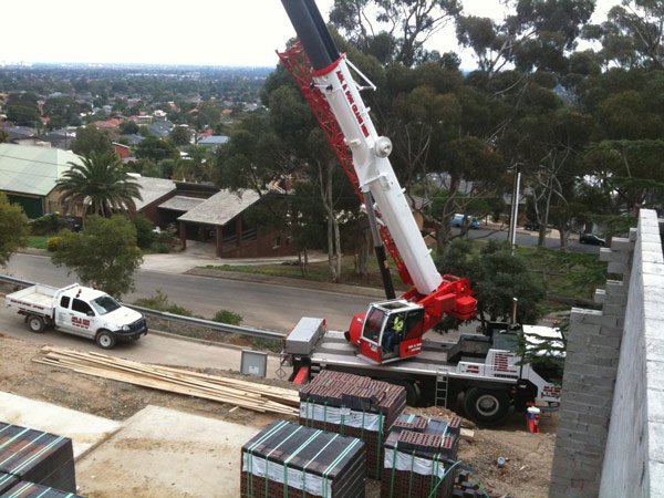 view of crane from top of building