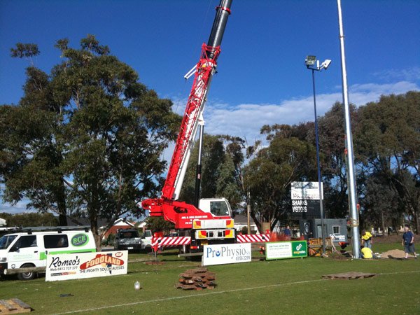 crane with a white van