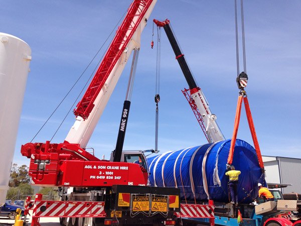 multiple cranes with blue object