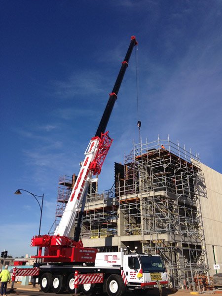 crane at three story building