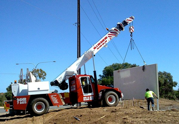 crane lifting wall