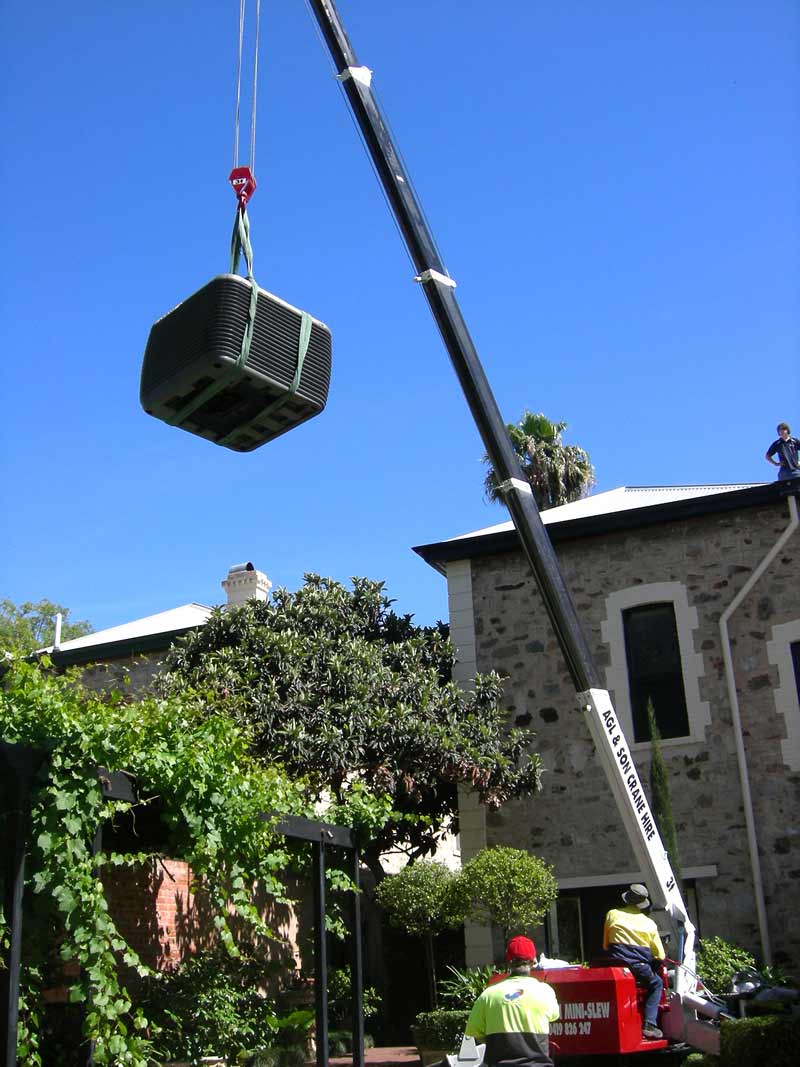 crane next to beautiful home