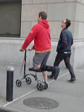 Man using knee walker