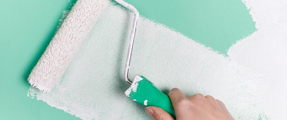 picture of a wall being painted white