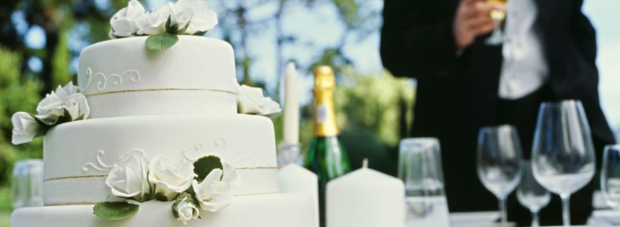 reception-at-wedding-with-cake-on-table