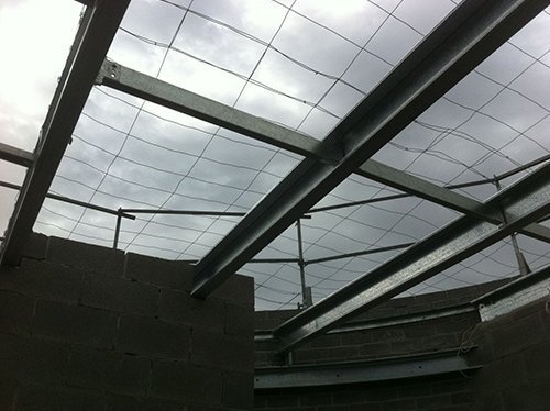 metal frames looking up at sky