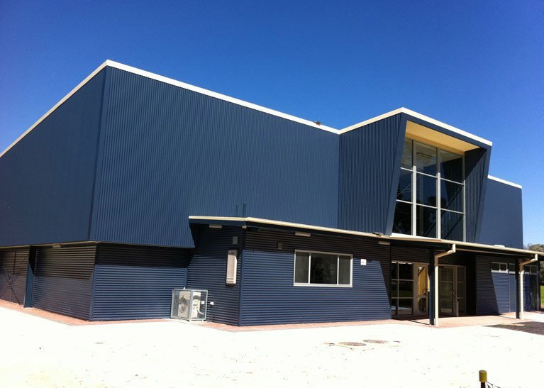 big blue modern angled building