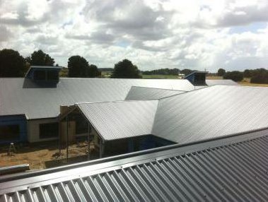 metal roofing and clouds in the sky