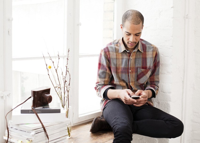 a man using his mobile phone