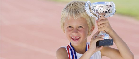 boy-with-trophy