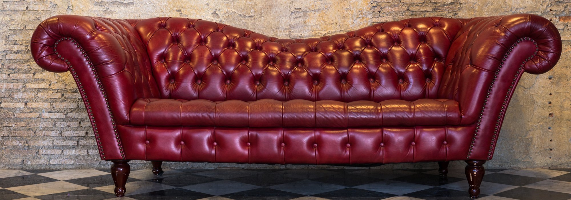 Three seater red sofaa