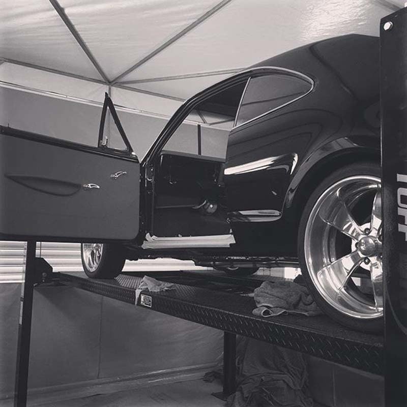 black car with open door