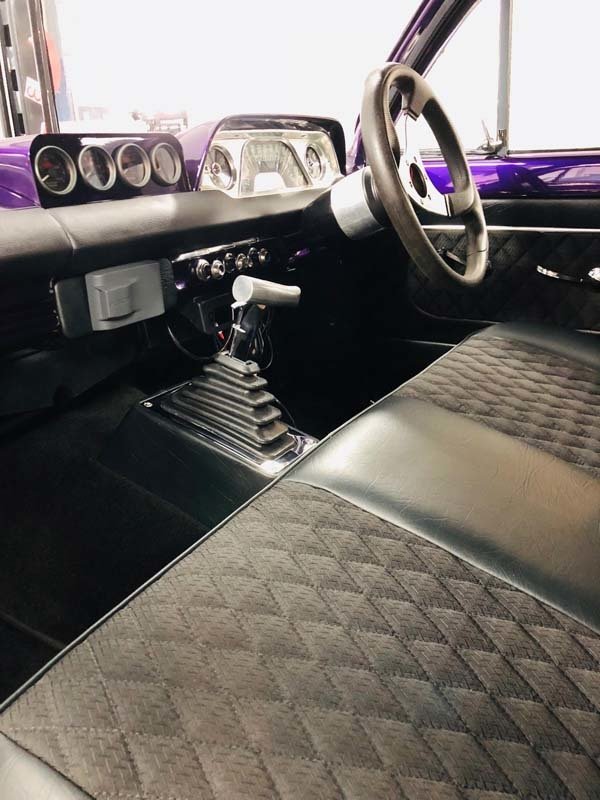 car seat upholstery on purple car