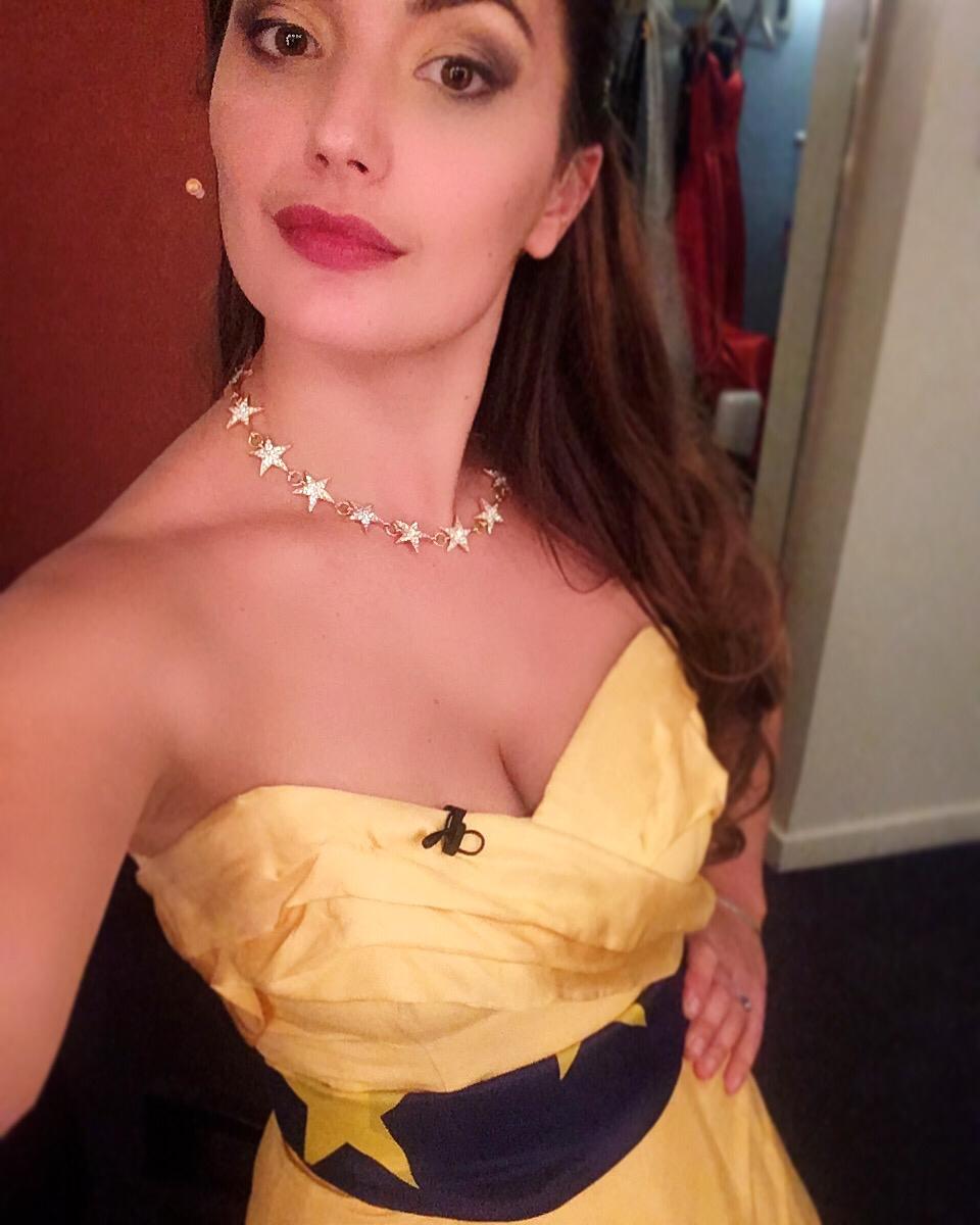 Anna's yellow and blue dress sparks political debate.