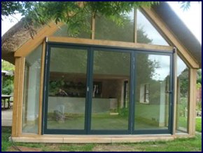 Lovely glass folding door opening up your home to sunshine