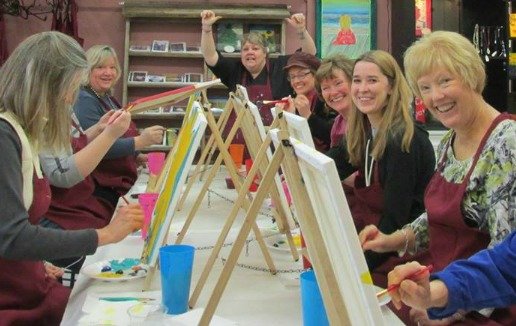 People painting at Date & Paint