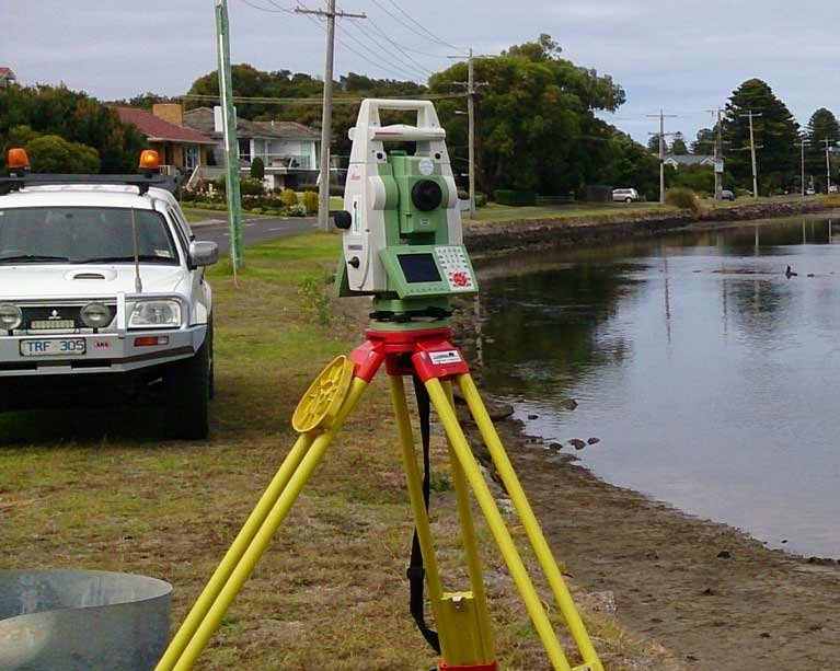 Joseph Land Surveying by river