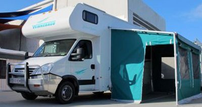 m and m tarp repairs truck parked in tarp