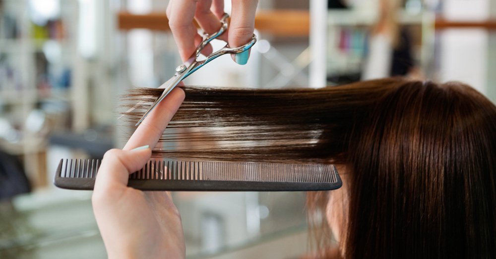 Girl getting a haircut in Cutting Edge which is a legacy of hair & style in Silverdale, NZ