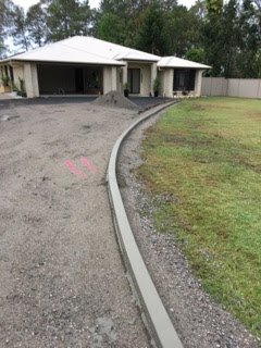 new cement curb in front of home