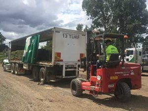 Handling_turf_landscape_truck_forklift