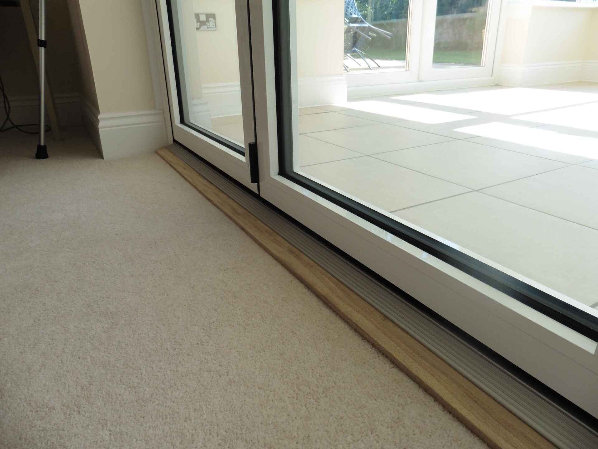 Internal Aluminium room divider bifold door installation in Sidmouth